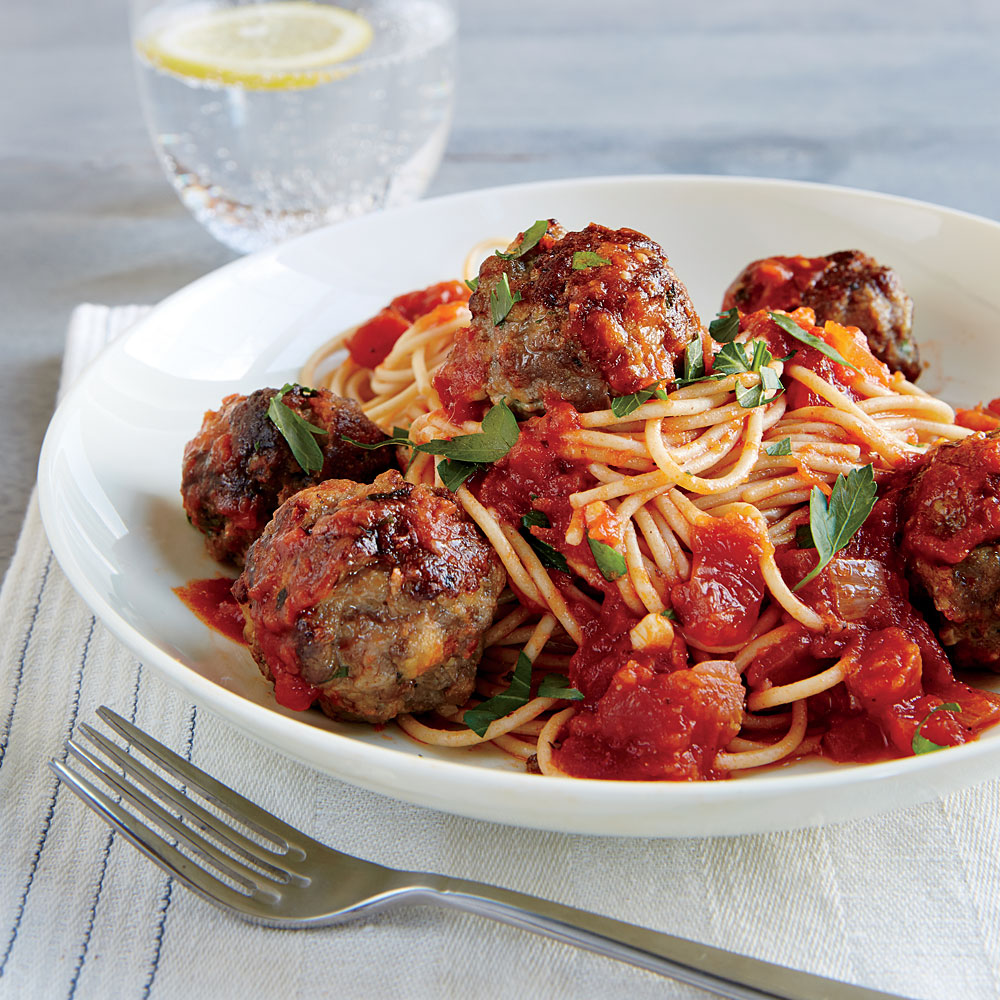 Spaghetti with meatballs and cherry tomatoes